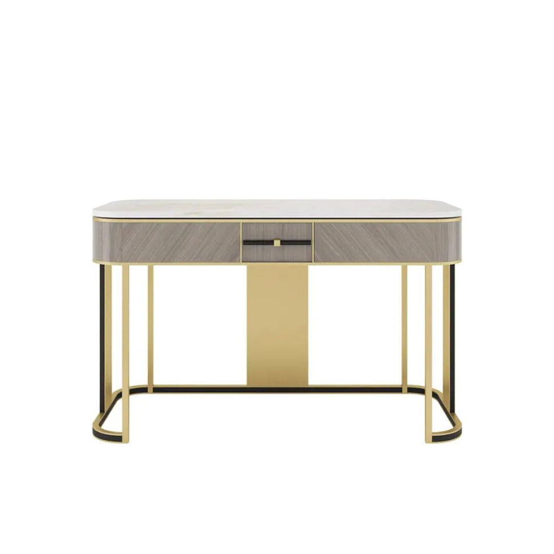Modern console table with marble top and gold legs on a white background
