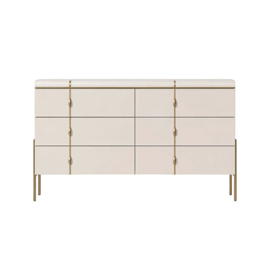 White dresser with gold accents on a white background