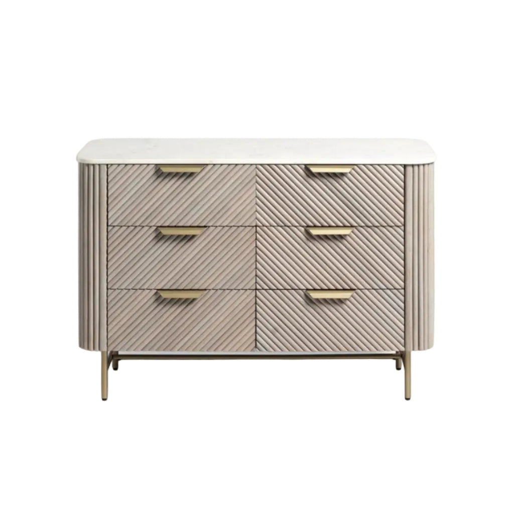 Beige dresser with gold handles on a white background
